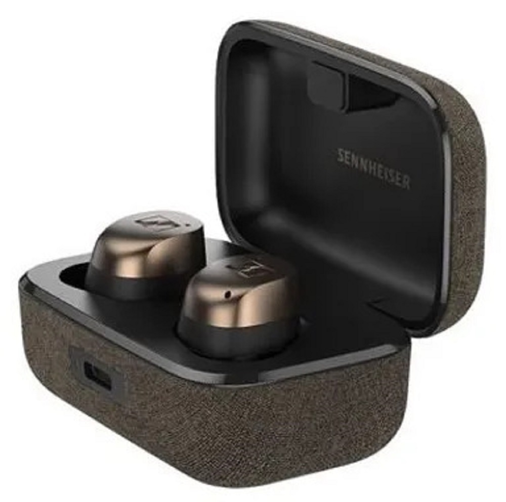 The Sennheiser Momentum True Wireless 4 earbuds resting inside the open brown fabric charging case.