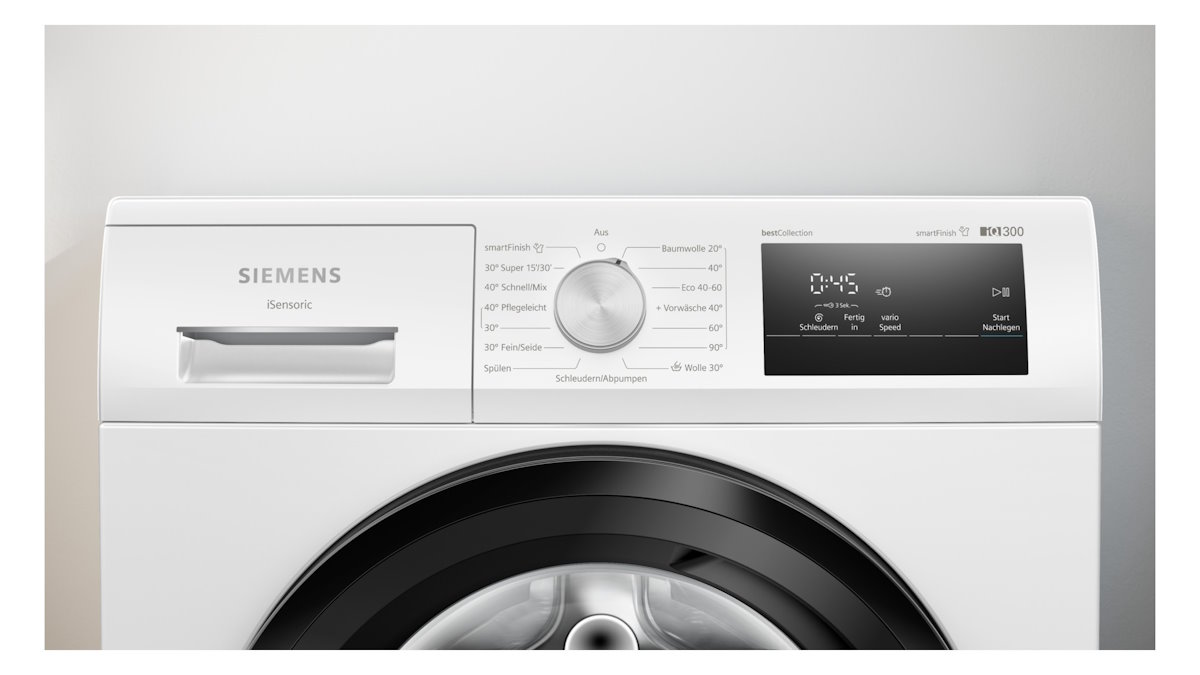 Close-up of the control panel of the Siemens WM14N0G4 washing machine with LED display and selection dial.