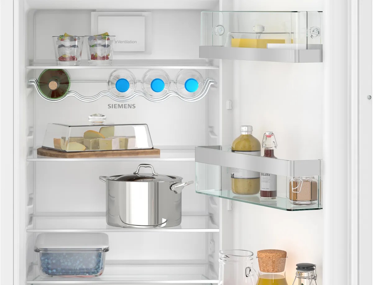 Interior view Siemens iQ500 fridge with glass shelves and lighting