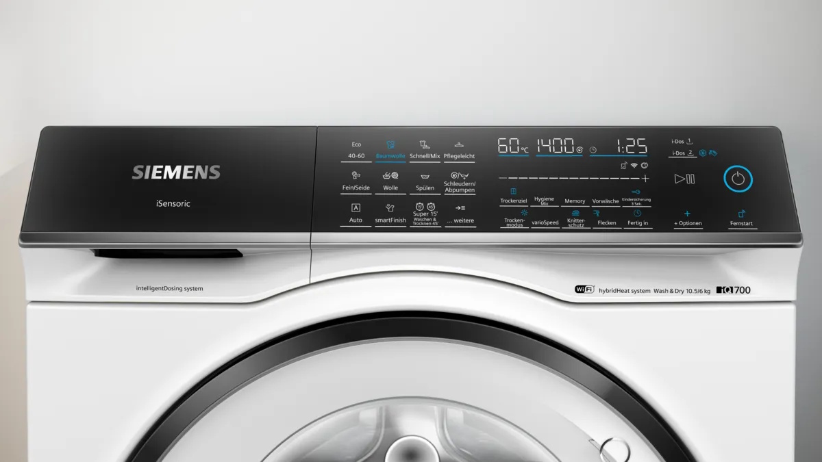 Close-up of the Siemens iQ700 washer-dryer multiTouch LED display and program selector.