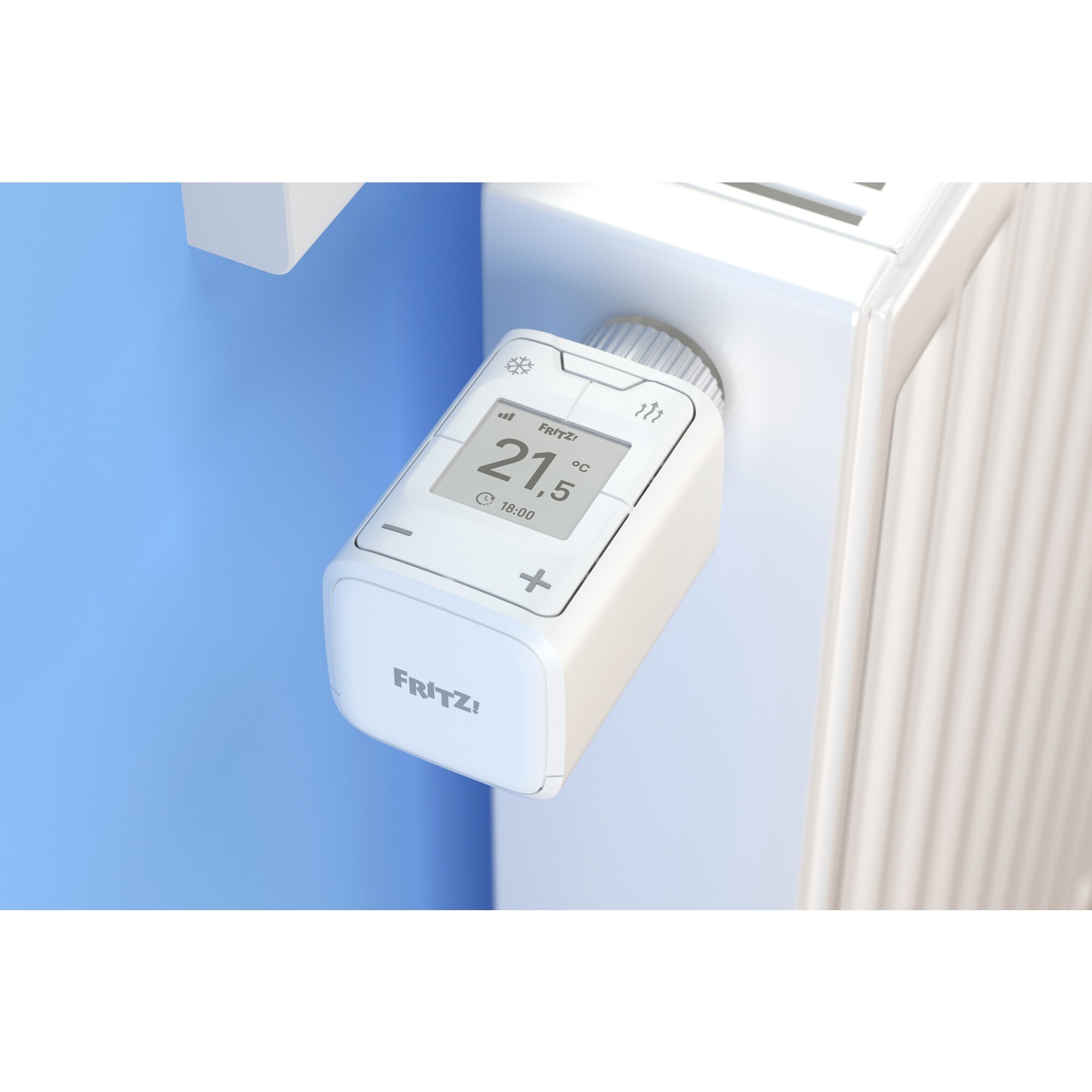 AVM FRITZ! DECT 302 heating thermostat in White mounted on radiator.