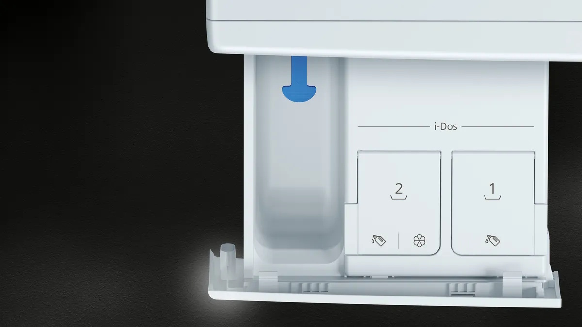 Close-up of the i-Dos system for automatic dosing of detergent and softener.