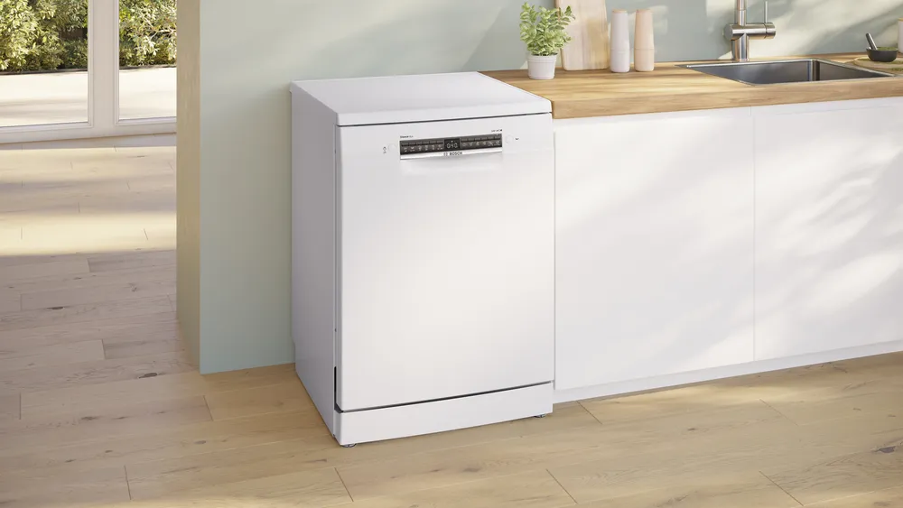Side view of the freestanding Bosch dishwasher in a kitchen