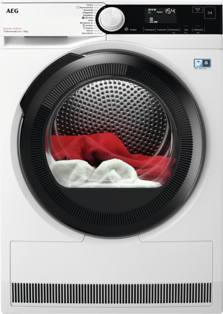 Front view of the AEG TR8T70689 heat pump dryer with laundry in the drum, showing the drying process.