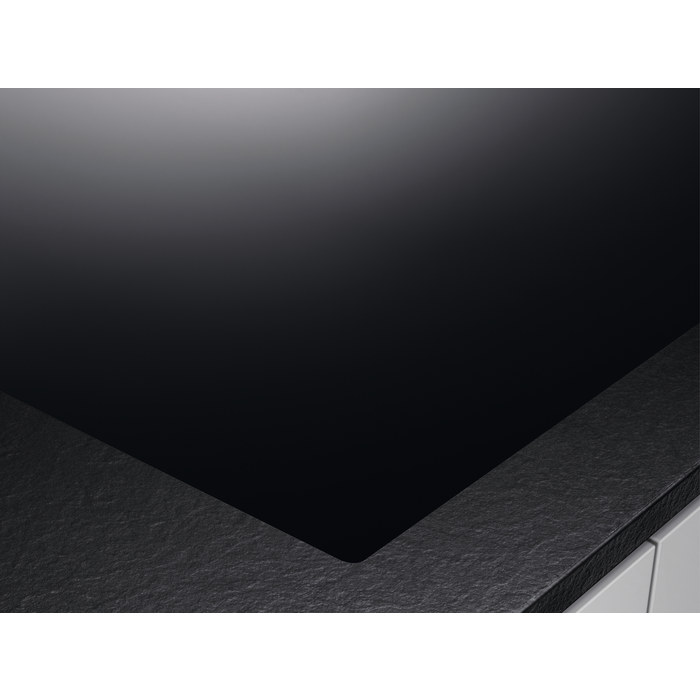 Side view of the AEG induction hob showing its slim design.
