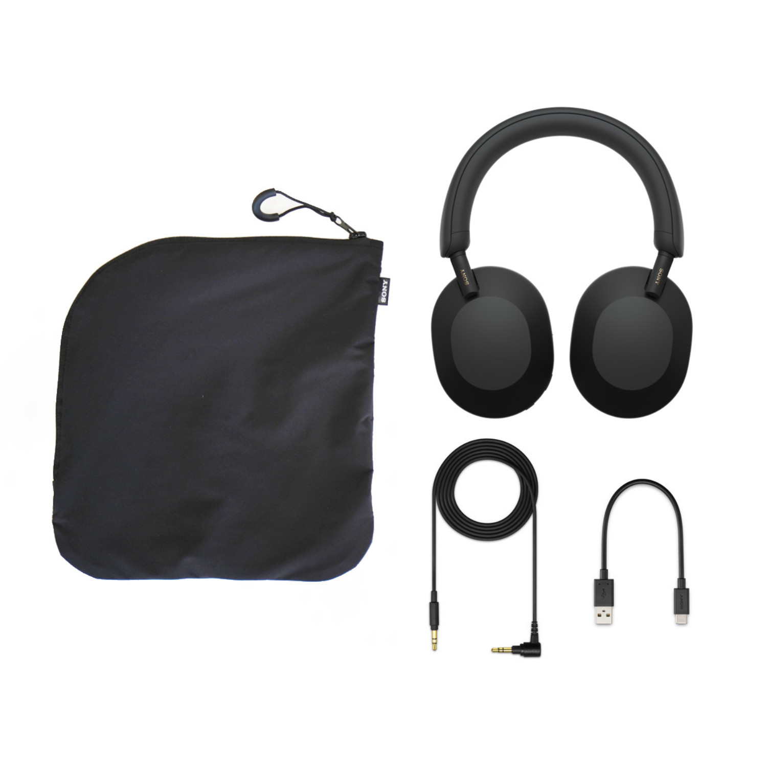 Sony WH-1000XM5 box contents: Headphones, collapsible carrying case, audio cable, and USB-C charging cable