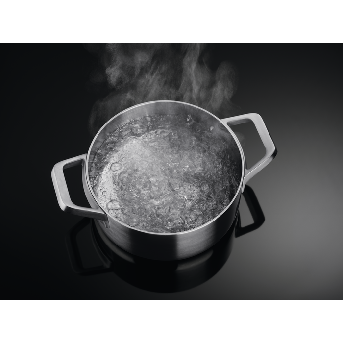 Hob in use with pots on the flexible zones.