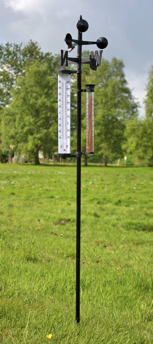 Westfalia analogue weather station – installed in the garden, with visible weather vane and thermometer.