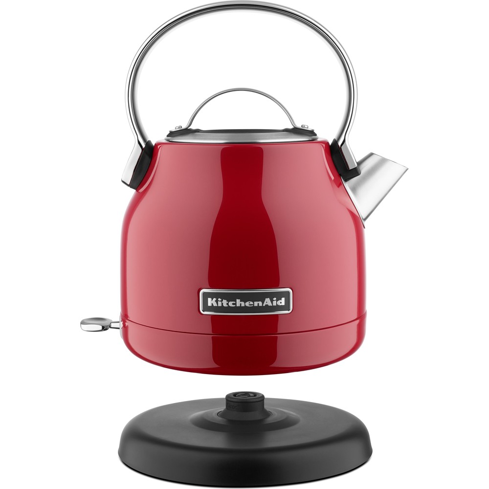 Right side view of the KitchenAid 5KEK1222EER kettle in Empire Red on its base station.