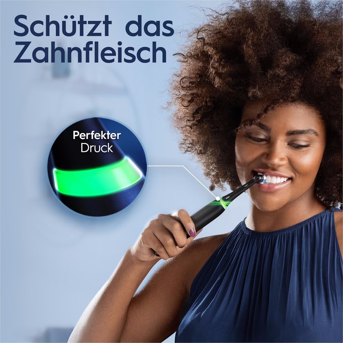 Oral-B iO White Clean toothbrush in use with pressure control