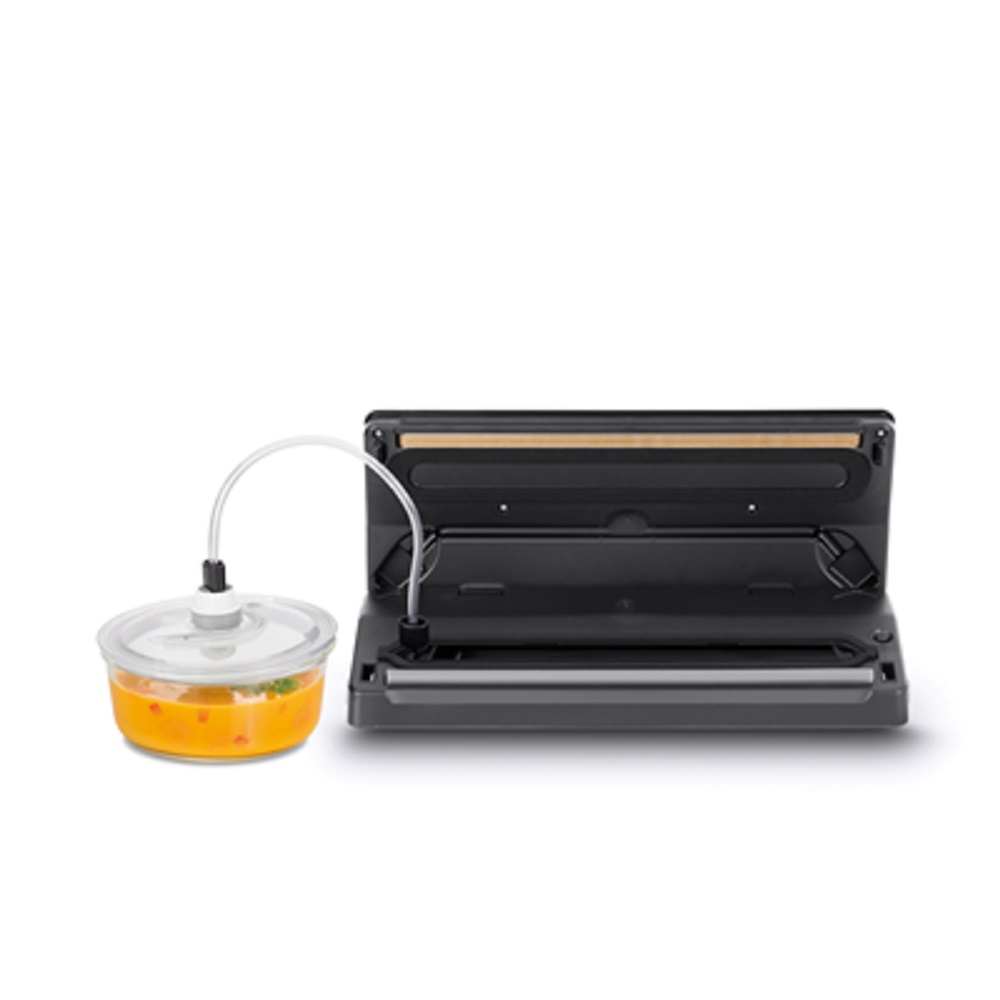 Vacuum sealer with hose being used for external vacuum canisters