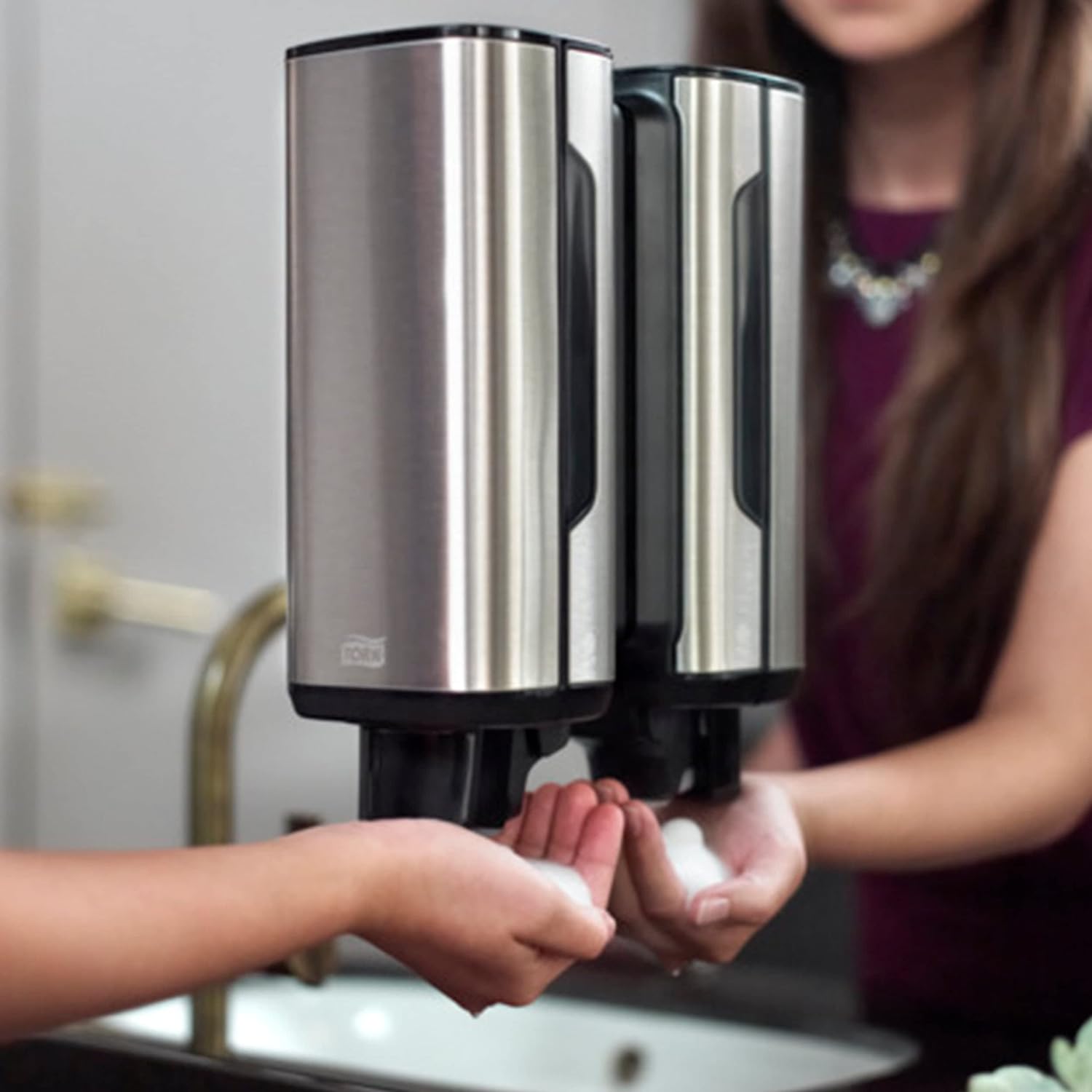 Tork foam soap, scene with wall-mounted soap dispenser.