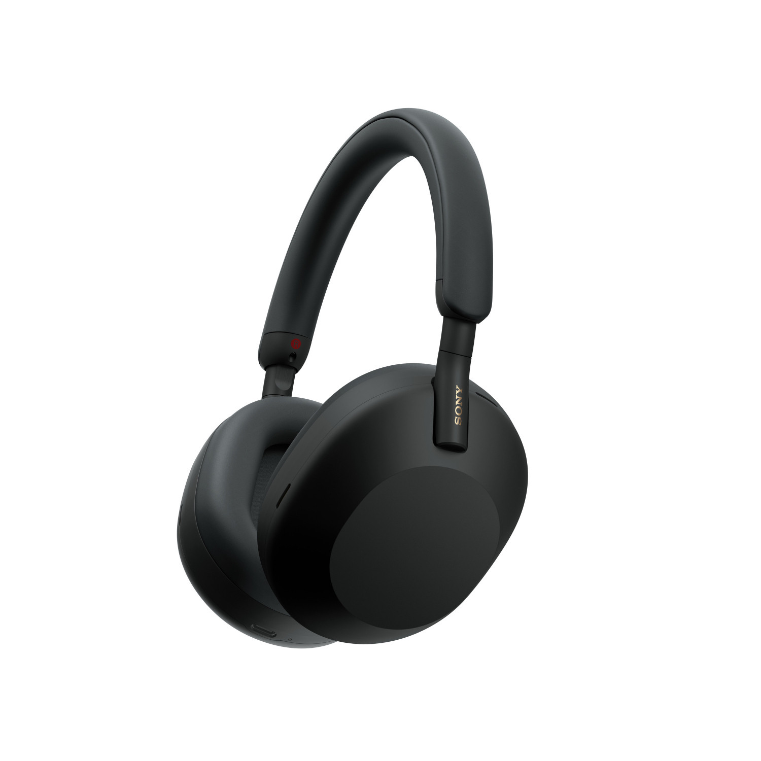 Dynamic angled view of the black over-ear headphones highlighting the ergonomic shape of the ear cups