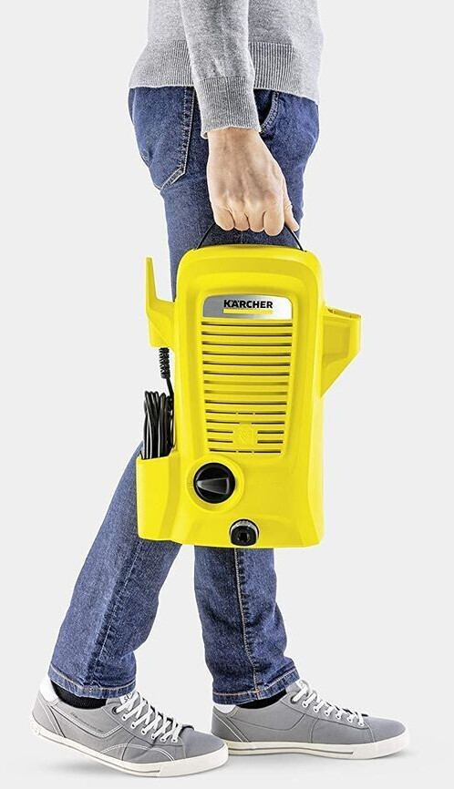 The portable Kärcher K 2 Universal Edition pressure washer in yellow is equipped with a high-pressure gun and a 3-meter hose.
