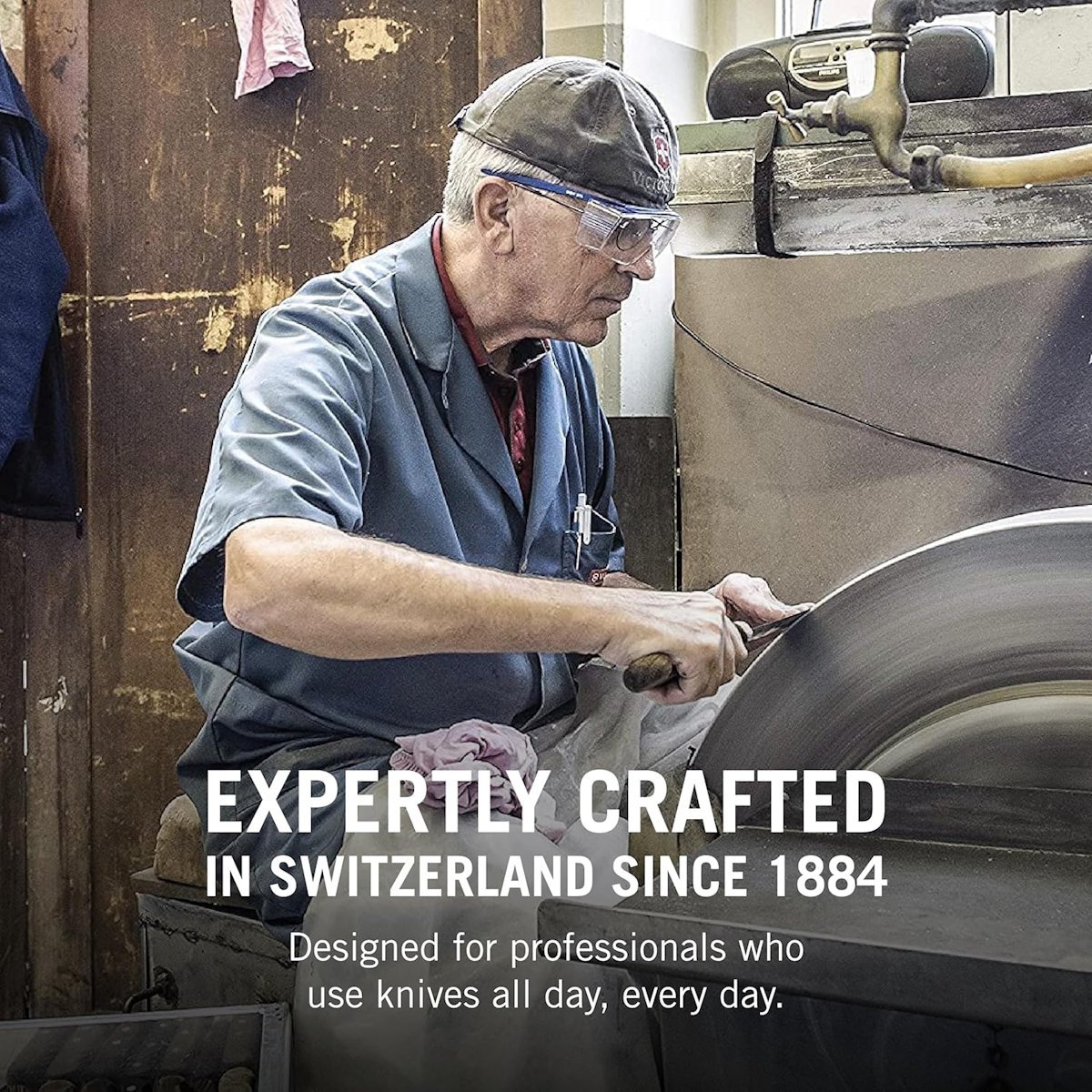 Victorinox craftsmanship: Detailed view of a worker sharpening a knife blade