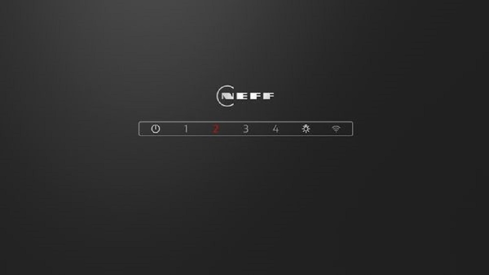 Close-up of the sleek black glass front with the illuminated TouchControl panel and LED display.