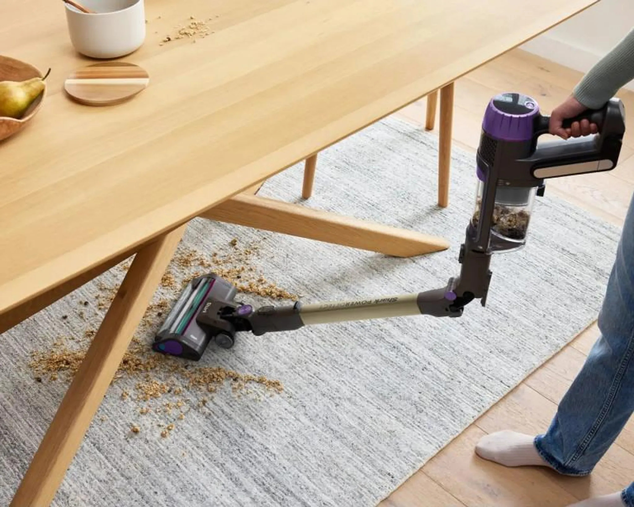 Shark IP3251EUT vacuum with flex wand easily cleaning under a table on carpet and hardwood floor