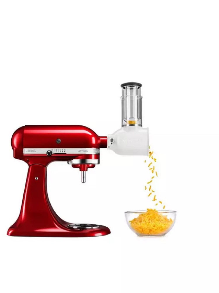 KitchenAid 5KSMFPPC grater attachment mounted on a stand mixer.